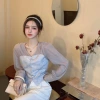Autumn and summer female Internet celebrity French very fairy-like chiffon shirt T-shirt design, with a unique and distinctive design sense, elegant base top Item Picture